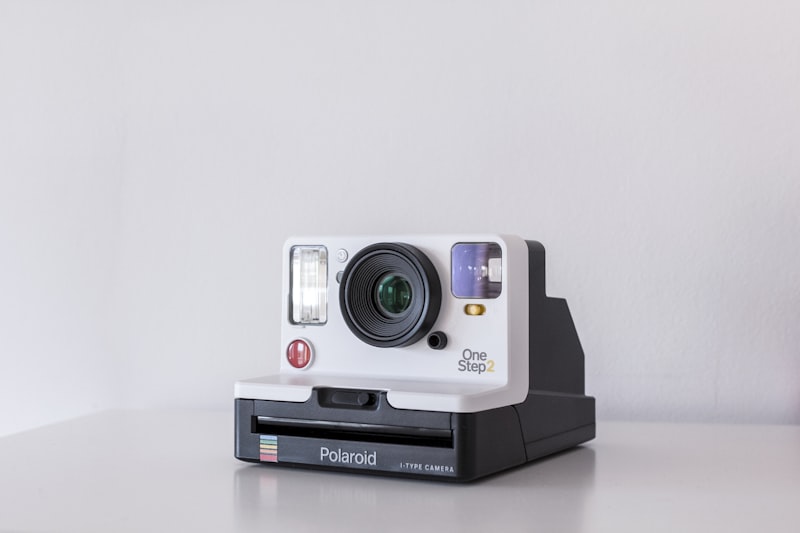 An instant camera on a white surface