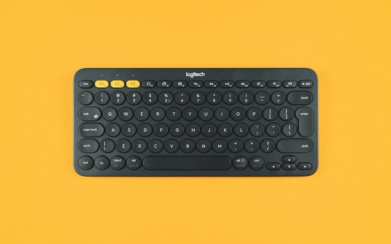 Black keyboard on a coloured surface